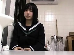 Pretty Japanese schoolgirl spreads her legs and gets her tw