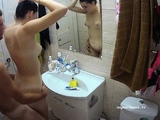 Hot brunette taking a shower on hidden cam