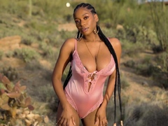 Big tits ebony teen model posing outdoor
